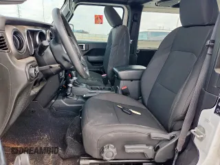 2023 Jeep Wrangler Sport with VIN 1C4HJXAG4PW667732, listed as a Copart auction lot 61261215 with 48,089 mi miles and Salvage title. Bid and sale history available at DreamBid. Image 7.