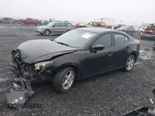 2015 Mazda 3 i SV with VIN JM1BM1T73F1243820, listed as a IAAI auction lot 41167112 with 126,063 mi miles. Bid and sale history available at carsss.com. Image 2.