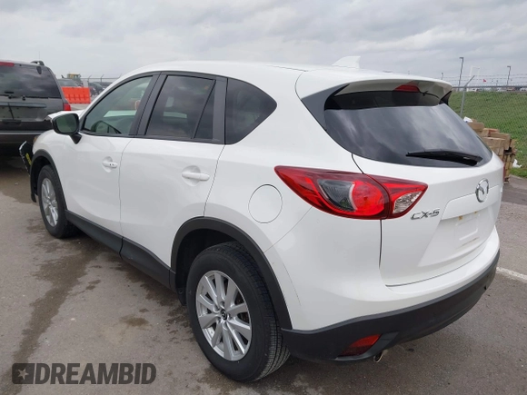2015 Mazda CX-5 Touring with VIN JM3KE2CY3F0550624, listed as a IAAI auction lot 41931268 with 51,588 mi miles and . Bid and sale history available at carsss.com. Image 3.