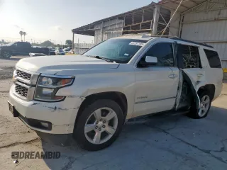 2015 Chevrolet Tahoe LT with VIN 1GNSCBKC1FR714895, listed as a Copart auction lot 60787185 with 239,815 mi miles and Salvage title. Bid and sale history available at DreamBid. Image 1.