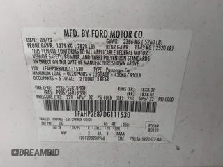 2013 Ford Taurus SEL with VIN 1FAHP2E87DG111530, listed as a IAAI auction lot 41322957 with 183,103 mi miles. Bid and sale history available at carsss.com. Image 9.