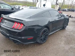 2018 Ford Mustang GT z VIN 1FA6P8CF2J5126231, wystawiony jako IAAI lot #41972432 z przebiegiem 59 402 mil mil oraz . Historia ofert i sprzedaży dostępna na DreamBid. Obrazek 4.