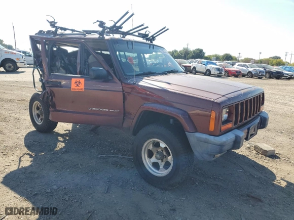 2000 Jeep Cherokee Police with VIN 1J4FF48S3YL141168, listed as a Copart auction lot 71612494 with NaN miles and Salvage Title. Bid and sale history available at carsss.com. Image 4.