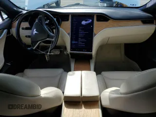 2019 Tesla Model S 100D with VIN 5YJSA1E44KF335113, listed as a Copart auction lot 82936844 with 89,770 mi miles and Salvage title. Bid and sale history available at DreamBid. Image 8.
