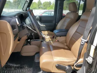 2011 Jeep Wrangler Unlimited Rubicon with VIN 1J4BA6H16BL561658, listed as a Copart auction lot 58379755 with 103,587 mi miles and Salvage title. Bid and sale history available at DreamBid. Image 7.