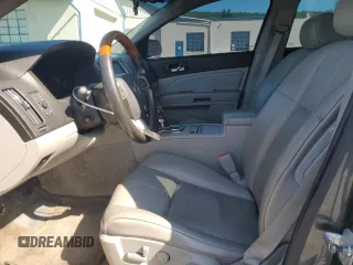 2008 Cadillac STS RWD z VIN 1G6DZ67A980172633, wystawiony jako Copart lot #59227065 z przebiegiem 186 288 mil mil oraz Szkoda całkowita • Salvage title. Historia ofert i sprzedaży dostępna na DreamBid. Obrazek 7.