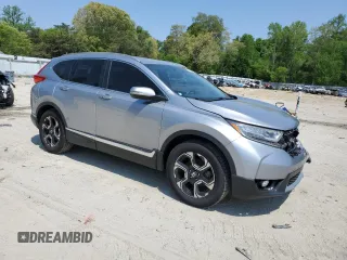 2018 Honda CR-V Touring with VIN 7FARW1H9XJE001467, listed as a Copart auction lot 55222005 with 65,611 mi miles and Salvage title. Bid and sale history available at DreamBid. Image 4.