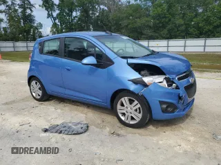 2015 Chevrolet Spark LS with VIN KL8CB6S96FC711594, listed as a Copart auction lot 55144845 with 20,296 mi miles and Salvage Title. Bid and sale history available at DreamBid. Image 4.