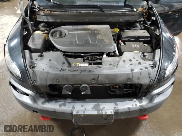 2014 Jeep Cherokee Trailhawk with VIN 1C4PJMBS5EW294212, listed as a Copart auction lot 88816885 with 151,779 mi miles and Salvage title. Bid and sale history available at DreamBid. Image 13.