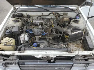 1984 Toyota Camry z VIN JT2SV16E3E0220882, wystawiony jako Copart lot #53514345 z przebiegiem 112 430 mil mil oraz Czysty tytuł • Clean title. Historia ofert i sprzedaży dostępna na DreamBid. Obrazek 11.
