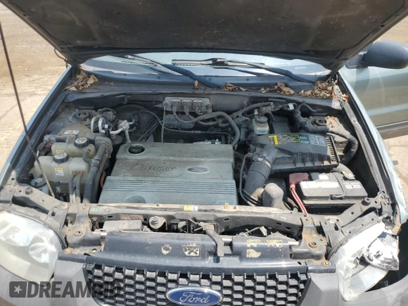 2006 Ford Escape Hybrid z VIN 1FMCU96H86KB36291, wystawiony jako Copart lot #64482105 z przebiegiem 224 253 mil mil oraz Czysty tytuł • Clean title. Historia ofert i sprzedaży dostępna na DreamBid. Obrazek 11.