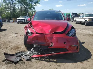2024 Tesla Model Y Long Range z VIN 7SAYGDEE6RA261108, wystawiony jako Copart lot #55252805 z przebiegiem 16 932 mil mil oraz Szkoda całkowita • Salvage title. Historia ofert i sprzedaży dostępna na DreamBid. Obrazek 5.