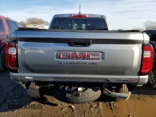 2023 GMC Canyon 4WD AT4 with VIN 1GTP6DEK5P1170230, listed as a Copart auction lot 42701935 with 26,704 mi miles and Salvage Title. Bid and sale history available at carsss.com. Image 6.