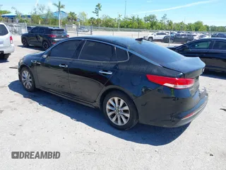 2017 Kia Optima EX with VIN 5XXGU4L35HG142807, listed as a IAAI auction lot 41856251 with 104,634 mi miles and . Bid and sale history available at carsss.com. Image 3.