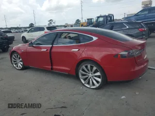 2013 Tesla Model S with VIN 5YJSA1AG7DFP12228, listed as a Copart auction lot 60040665 with 87,674 mi miles and Clean title. Bid and sale history available at DreamBid. Image 2.