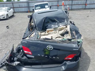 2007 Toyota Avalon XL z VIN 4T1BK36B87U237055, wystawiony jako IAAI lot #42188161 z przebiegiem 139 466 mil mil oraz . Historia ofert i sprzedaży dostępna na DreamBid. Obrazek 11.