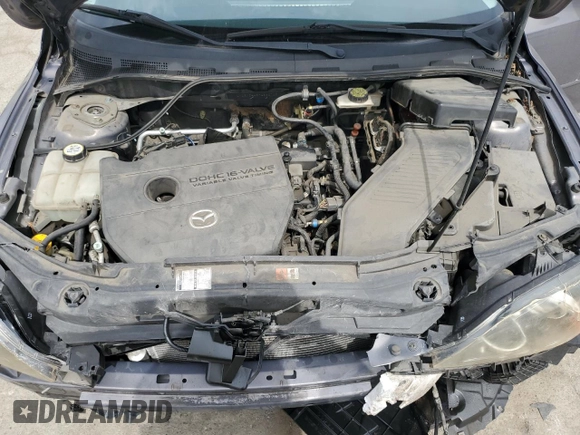 2007 Mazda 3 S Touring z VIN JM1BK344571662713, wystawiony jako Copart lot #59407825 z przebiegiem 107 723 mil mil oraz Szkoda całkowita • Salvage title. Historia ofert i sprzedaży dostępna na DreamBid. Obrazek 11.