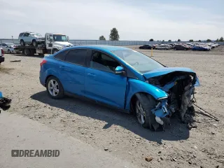 2012 Ford Focus SE with VIN 1FAHP3F22CL468085, listed as a Copart auction lot 61263665 with Not provided miles and Salvage title. Bid and sale history available at DreamBid. Image 4.