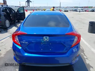 2017 Honda Civic LX z VIN 2HGFC2F56HH516730, wystawiony jako IAAI lot #42130963 z przebiegiem 119 236 mil mil oraz . Historia ofert i sprzedaży dostępna na DreamBid. Obrazek 16.