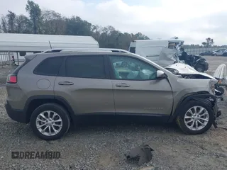 2020 Jeep Cherokee Latitude with VIN 1C4PJLCB8LD525508, listed as a IAAI auction lot 40972966 with 28,609 mi miles and . Bid and sale history available at DreamBid. Image 13.