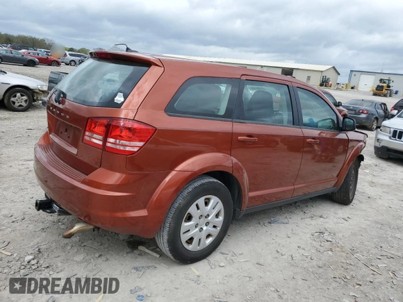 2014 Dodge Journey American Value with VIN 3C4PDCAB8ET133197, listed as a Copart auction lot 51381145 with 191,269 mi miles and Salvage title. Bid and sale history available at DreamBid. Image 3.