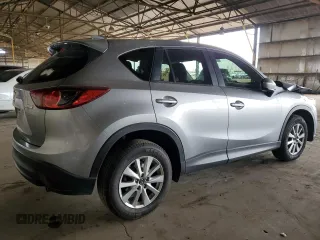 2014 Mazda CX-5 Touring z VIN JM3KE2CY7E0349484, wystawiony jako Copart lot #51188665 z przebiegiem 175 131 mil mil oraz Szkoda całkowita • Salvage title. Historia ofert i sprzedaży dostępna na DreamBid. Obrazek 3.