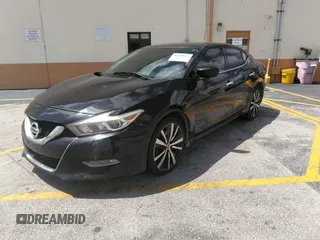 2016 Nissan Maxima SR with VIN 1N4AA6AP9GC428938, listed as a IAAI auction lot 42419663 with 121,501 mi miles and . Bid and sale history available at DreamBid. Image 2.