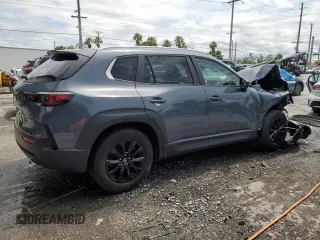 2023 Mazda CX-50 S Preferred Plus z VIN 7MMVABCM7PN103829, wystawiony jako Copart lot #56235495 z przebiegiem 42 473 mil mil oraz Nie do naprawy • Non repairable. Historia ofert i sprzedaży dostępna na DreamBid. Obrazek 3.