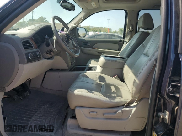 2007 GMC Yukon SLT with VIN 1GKFK13057J345796, listed as a Copart auction lot 71773124 with 218,788 mi miles and Salvage Title. Bid and sale history available at DreamBid. Image 7.