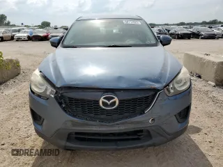 2015 Mazda CX-5 Sport z VIN JM3KE2BE8F0434116, wystawiony jako Copart lot #60712625 z przebiegiem 300 405 mil mil oraz Szkoda całkowita • Salvage title. Historia ofert i sprzedaży dostępna na DreamBid. Obrazek 5.