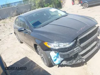 2020 Ford Fusion SE z VIN 3FA6P0T99LR199141, wystawiony jako IAAI lot #42231681 z przebiegiem 36 219 mil mil oraz . Historia ofert i sprzedaży dostępna na DreamBid. Obrazek 1.
