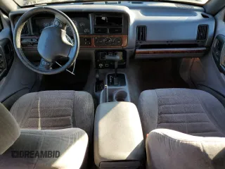 1998 Jeep Grand Cherokee Laredo with VIN 1J4GZ58S0WC106148, listed as a Copart auction lot 42855105 with 263,785 mi miles and Salvage Title. Bid and sale history available at carsss.com. Image 8.