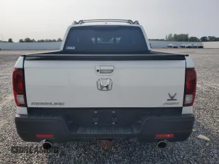 2022 Honda Ridgeline RTL-E with VIN 5FPYK3F70NB006495, listed as a Copart auction lot 57756735 with 43,874 mi miles and Salvage title. Bid and sale history available at DreamBid. Image 6.