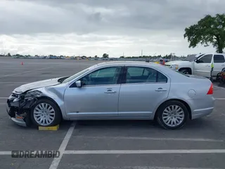 2010 Ford Fusion Hybrid with VIN 3FADP0L37AR261099, listed as a IAAI auction lot 41903543 with 160,070 mi miles. Bid and sale history available at carsss.com. Image 14.