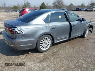 2017 Volkswagen Passat SE with VIN 1VWBT7A36HC039748, listed as a IAAI auction lot 41915674 with 57,012 mi miles and . Bid and sale history available at DreamBid. Image 4.