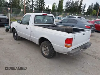 1997 Ford Ranger XLT with VIN 1FTCR10A2VUB88585, listed as a IAAI auction lot 42132083 with 233,961 mi miles. Bid and sale history available at carsss.com. Image 3.