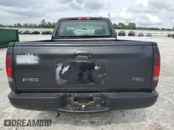 2003 Ford F-150 XL с VIN 1FTRX17273NB20966, выставлен на аукционе Copart как лот 53798005 с пробегом 217 855 миль миль и Списание • Salvage title. История ставок и продаж доступна на DreamBid. Изображение 6.