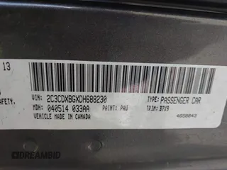 2013 Dodge Charger SE with VIN 2C3CDXBGXDH688230, listed as a IAAI auction lot 41634325 with 133,519 mi miles. Bid and sale history available at carsss.com. Image 9.