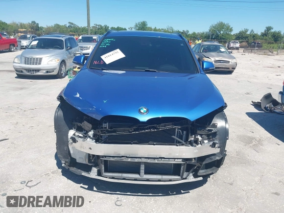 2017 BMW X1 sDrive28i with VIN WBXHU7C31H5H33281, listed as a IAAI auction lot 41814792 with 55,756 mi miles. Bid and sale history available at carsss.com. Image 13.
