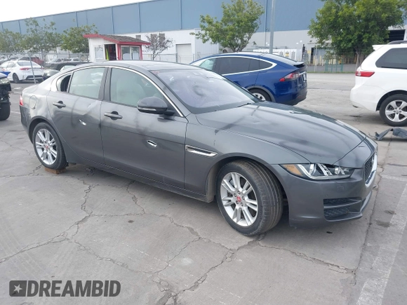 2017 Jaguar XE 25t Premium with VIN SAJAD4BG0HA975017, listed as a IAAI auction lot 41589536 with 40,136 mi miles. Bid and sale history available at carsss.com. Image 1.