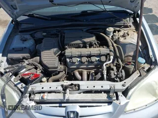 2002 Honda Civic LX with VIN 1HGES15562L039463, listed as a IAAI auction lot 41851232 with 173,411 mi miles. Bid and sale history available at carsss.com. Image 10.