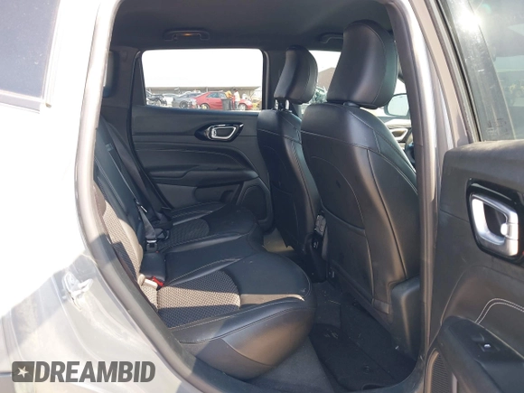 2023 Jeep Compass Latitude with VIN 3C4NJDBN6PT531767, listed as a IAAI auction lot 42254833 with 57,630 mi miles and . Bid and sale history available at DreamBid. Image 8.