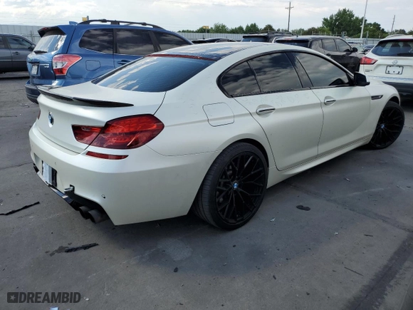 2015 BMW 6 Series 650i xDrive with VIN WBA6B4C55FD761396, listed as a Copart auction lot 61322034 with 138,024 mi miles and Clean Title. Bid and sale history available at carsss.com. Image 3.