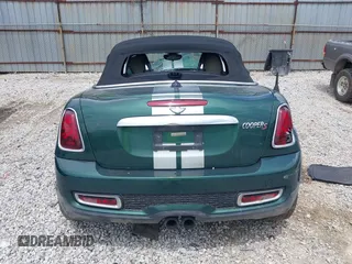 2013 MINI Roadster S z VIN WMWSY3C55DT566134, wystawiony jako IAAI lot #42265800 z przebiegiem Nie podano mil oraz . Historia ofert i sprzedaży dostępna na DreamBid. Obrazek 16.