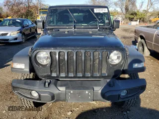 2021 Jeep Wrangler Sport S with VIN 1C4GJXAN4MW697450, listed as a Copart auction lot 81024914 with 75,820 mi miles and Salvage Title. Bid and sale history available at DreamBid. Image 5.