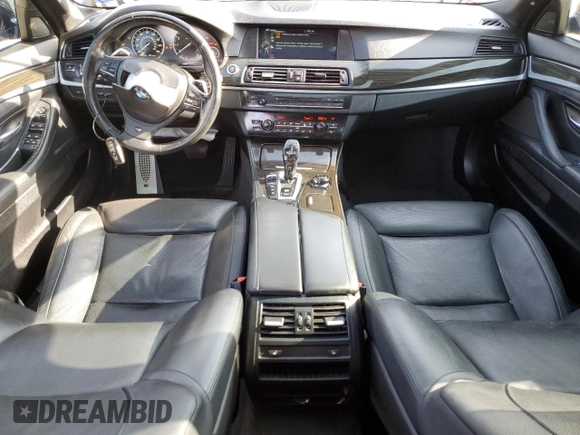 2013 BMW 5 Series 550i xDrive z VIN WBAFU9C59DDY72859, wystawiony jako Copart lot #56211465 z przebiegiem 98 620 mil mil oraz Szkoda całkowita • Salvage title. Historia ofert i sprzedaży dostępna na DreamBid. Obrazek 8.