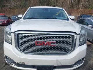2016 GMC Yukon Denali with VIN 1GKS2CKJ9GR334645, listed as a IAAI auction lot 41781040 with 141,405 mi miles. Bid and sale history available at carsss.com. Image 12.