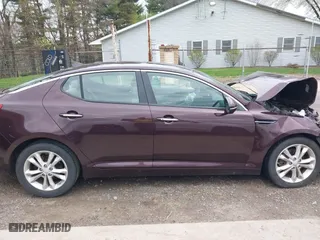 2013 Kia Optima EX with VIN 5XXGN4A79DG240428, listed as a IAAI auction lot 42017665 with 94,765 mi miles. Bid and sale history available at carsss.com. Image 14.