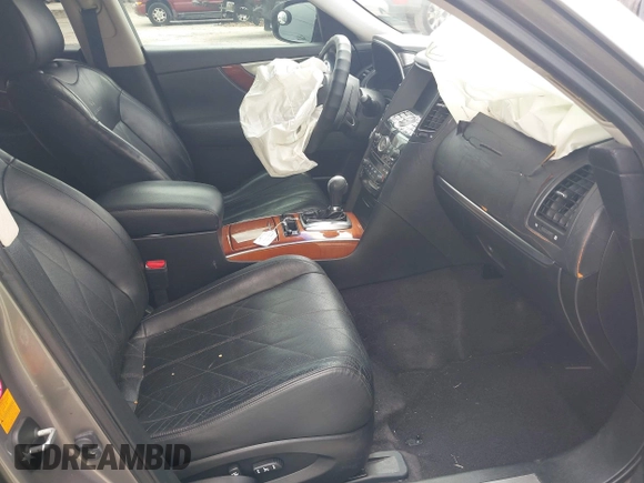 2009 Infiniti FX with VIN JNRAS18U39M101020, listed as a IAAI auction lot 41663215 with 210,583 mi miles and . Bid and sale history available at DreamBid. Image 5.
