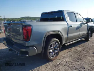 2024 GMC Sierra 1500 with VIN 1GTPHGE89RZ120273, listed as a IAAI auction lot 40288504 with 24,296 mi miles and . Bid and sale history available at DreamBid. Image 4.
